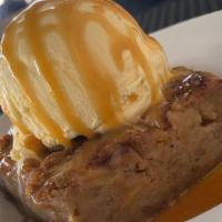Housemade Apple Jack Bread Pudding · Served with vanilla bean ice cream.