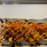 Volcanic Lava Roll · Crab, avocado and cream cheese inside.Topped with cheddar cheese, fish, masago,spicy mayo an...