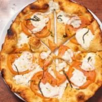Margherita Pizza · Sliced tomato, fresh mozzarella, basil, and garlic.