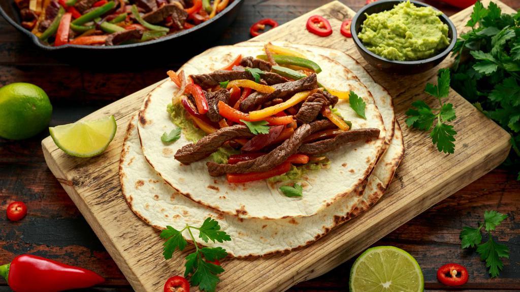 Beef Fajitas · Delicious 3 soft tortillas with juicy beef, rice, beans, lettuce and vinaigrette.