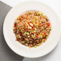 Arruoz Chaufa · A Peruvian fried rice dish. It’s a mix of Peruvian and Chinese cuisines and consists of a mi...
