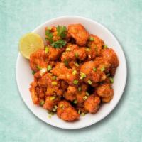(Vegan) Zesty Cauliflower Bomb · A popular Indo Chinese dish with crispy fried cauliflower florets, tossed in a spicy sauce g...