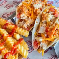 2 Hot Chicken Tacos With Side · Crispy hot chicken, pico de gallo, shredded cheese, jalapeno creme fraiche or regular sour c...
