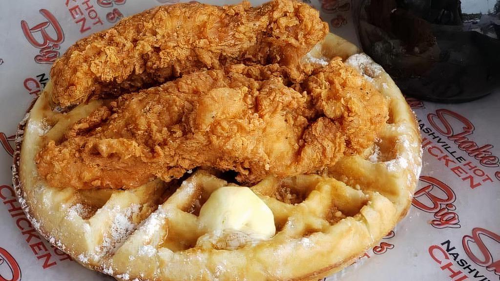 Hot Chicken & Waffles · Hot chicken and waffles comes with a Belgian style waffle, 3 jumbo tenders. A customer favorite.