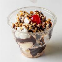Small Fudge Sundae · One scoop vanilla ice cream with fudge topping, whipped cream, nuts, cherry.