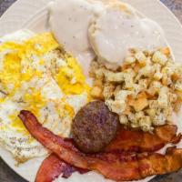 All American Breakfast · Three eggs cooked any style, two strips of bacon, sausage patty, breakfast potatoes or grits...