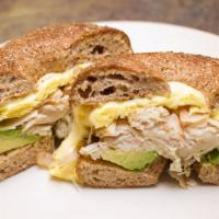 West Coast · A toasted wheat bagel with avocado, smoked turkey, scrambled egg, and Jack cheese.