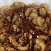 Chocolate Flavored Funnel Cake · COMES WITH POWDER SUGAR & CHOCOLATE SYRUP