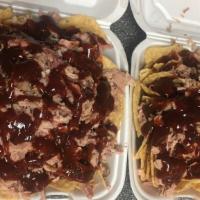Lg Bbq Nachos · COMES WITH PORK BBQ NACHO CHEESE HOT PEPPERS ON THE SIDE