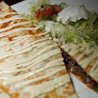Midtown Quesadilla · Shredded cheese, peppers, onions, lettuce, sour cream, guac, pico