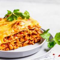 Classic Lasagna · Bubbling layers of pasta, seasoned ground beef, signature marinara sauce, and herbed ricotta...