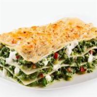 Spinach Lasagna · Bubbling layers of pasta, sautéed spinach with garlic, onion, and herbed ricotta, smothered ...