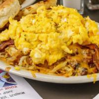 Orleans Slammer - Not Opp · A hurricane of hash browns, Slims chili, two strips bacon, two eggs & melted Cheddar, toast ...