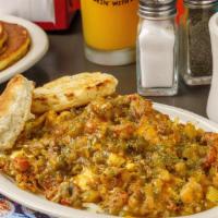 Creole Slammer · Out of the swamps comes a dish of hash browns drowned in Slims Crawfish Etouffee, two eggs  ...