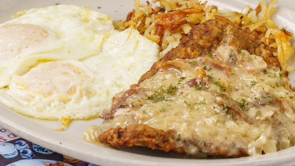 Chicken Fried Steak & Eggs · With Creole country gravy, two eggs your way & crispy hashbrowns