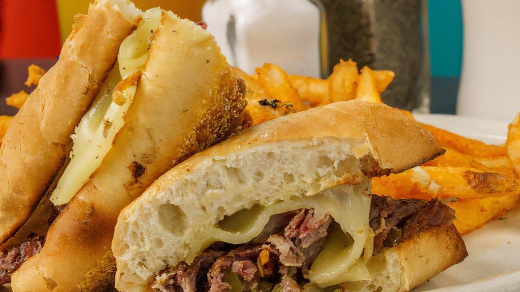 Philly Steak Slimwich · Beef steak, grilled with onions, green peppers, mushrooms, hot peppers & melted Provolone cheese on a Philly bun. ONLY Naked*