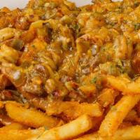 Crawfish Cheese Fries · French fries topped with etouffee & melted Cheddar cheese