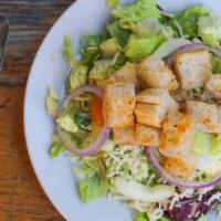 Grand Isle House Salad · Romain, bibb, cucumber, cherry tomato, grated cheddar, red onion, croutons.