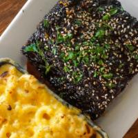 ½ Rack Sticky Ribs · Sticky baby back ribs with macaroni and cheese.