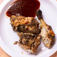 Jerk Chicken · Slow Cooked, succulent chicken in a secret blend of spices.