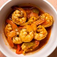 Coconut Curry Shrimp · Simmered in a rich coconut sauce infused with curry.