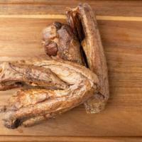 Smoked Turkey Wings · One pack. Approximately 1 lb. 
Turkey wings seasoned and smoked. Fully cooked, ready to eat,...