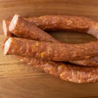 Smoked Pepper Jack Sausage · One pack. Approximately 1.25 lbs.
Our smoked sausage with added cubes of Pepper Jack Cheese....