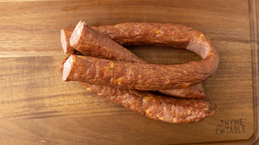 Smoked Pepper Jack Sausage · One pack. Approximately 1.25 lbs.
Our smoked sausage with added cubes of Pepper Jack Cheese.  Great for grilling, pan frying, or eating as a snack.