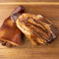 Smoked Pig Tails · One pack. Approximately 1/2 lb.
Pig tails seasoned and smoked. Great for seasoning your favo...