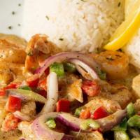 Shrimp With Garlic And Butter Sauce / Camarones Al Ajillo · garlic marinated shrimp sautéed with onions and peppers served with white rice, habichuelas,...