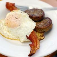 Hungry Human Bowl · 2 Bear Creek Farm Sausage Patties, Bacon,  2 Eggs Any Style, Served on a Bed of Cheesy Hatch...
