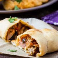 All Meat Calzone · Folded pie made with fresh dough, and stuffed with a blend of cheeses, pepperoni, Italian sa...