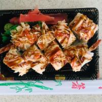 Sp15. Hurricane Roll · Shrimp, tempura, cucumber inside, spicy Kani on the top with eel sauce.