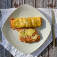 Chimichanga · Fried burrito-large flour tortilla filled with your choice of meat, fried and smothered with...