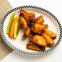 Jumbo Chicken Wings (10) · Unbreaded wings served buffalo or barbeque style with carrots and celery, with ranch or bleu...