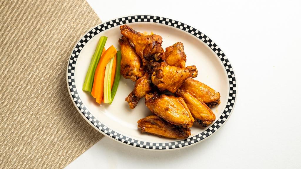 Jumbo Chicken Wings (10) · Unbreaded wings served buffalo or barbeque style with carrots and celery, with ranch or bleu cheese dressing.