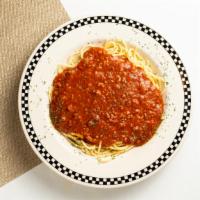 Spaghetti · A mound of tender spaghetti covered with meat or marinara sauce.