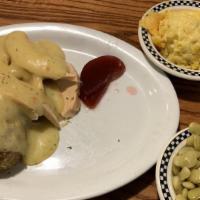 Hot Open Face Turkey · Roasted turkey breast sliced and served over bread with mashed potatoes, smothered with turk...