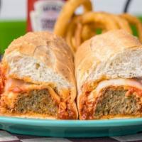 Meatball Parmigiana · Ground beef meatballs, melted mozzarella cheese and tomato sauce