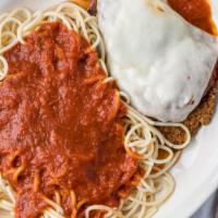 Chicken Parmigiana · Breaded chicken breast topped with melted mozzarella cheese and our homemade tomato sauce se...