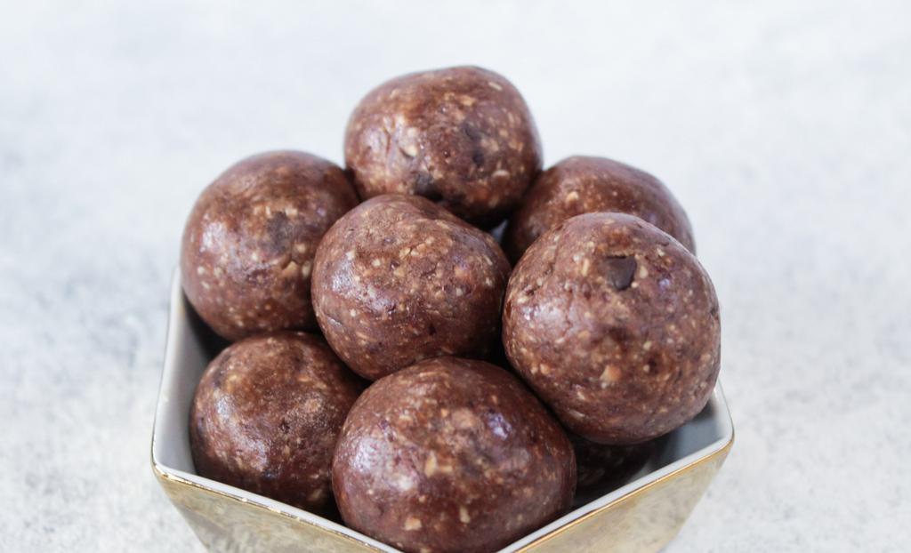 Chocolate Peanut Butter Energy Bites · Gluten free. Rolled oats, dates, peanut butter, vegan chocolate protein, dairy free chocolate chips and maple syrup. Comes 3 to a pack.