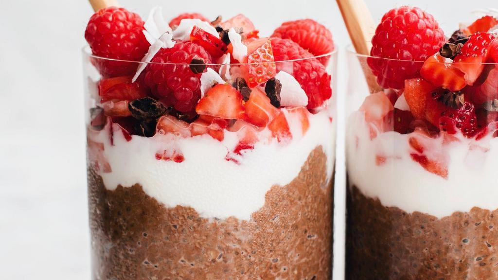Chocolate Chia Pudding · Chocolate Protein Chia Pudding topped with maple cashew granola and fresh berries