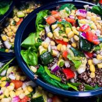 Mexican Chopped Salad Bowl · Spinach, spring mix, quinoa, black beans, corn, red bell pepper, red onion, cilantro with Ch...