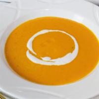 Carrot Ginger Soup · Roasted carrots and fresh ginger blended in a coconut and vegetable broth
