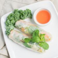 Garden Roll · Two fresh spring rolls served with sweet chili sauce and topped with  crushed peanuts.