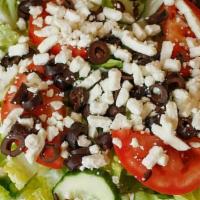 Greek Salad · House salad with feta cheese and black olives.