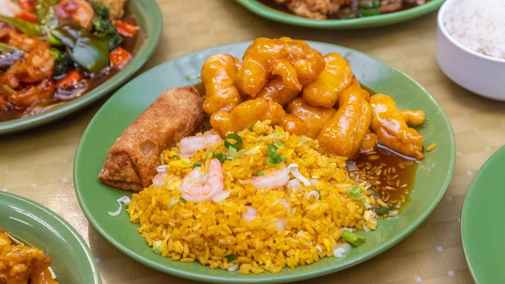 Sweet & Sour Chicken · Served with roast pork fried rice and egg roll.