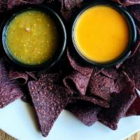 Vegan Queso · Gluten-free. Served with salsa verde and non-GMO tortilla chips.