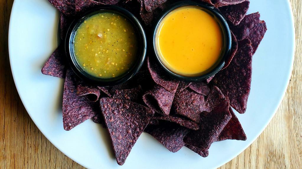 Vegan Queso · Gluten-free. Served with salsa verde and non-GMO tortilla chips.