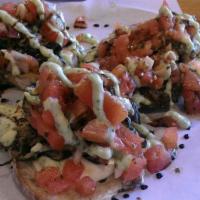 Eggplant Bruschetta · Three toast points, homemade mozzarella, grilled eggplant, and fresh basil, drizzled with a ...